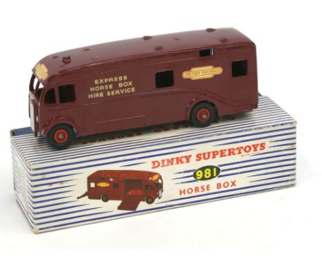 Dinky Toys 981 British Railways Horse Box, maroon body, red diecast wheel hubs, in near mint condition, with a excellent blue