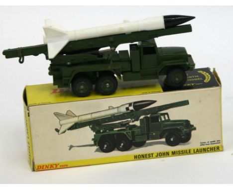 Dinky Toys 665 Honest John Missile Launcher, military green body, near mint condition, with replacement missile, original box