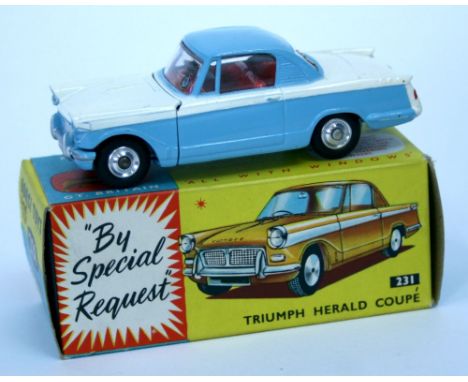 Corgi Toys  231 Triumph Herald Coupe’ light blue/white body, red interior, spun wheels, in near mint boxed condition 