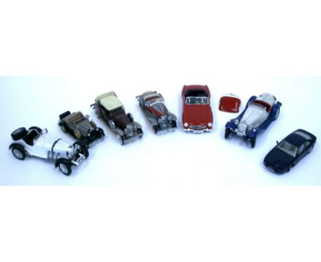 Quantity of Unboxed Diecast Models including Danbury Mint Duesenberg SSJ with certificate, Ford Model A Deluxe Roadster with 