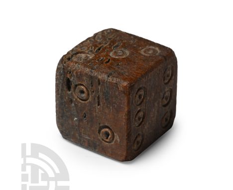 1st-4th century A.D. Cuboid with ring-and-dot marks disposed 1:6, 2:5, 3:4.  4.7 grams, 14 mm (1/2 in.). [No Reserve]Acquired