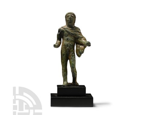 2nd-3rd century A.D. Standing nude with left leg bent, arms extended, mantle draped from the right shoulder, hair combed forw