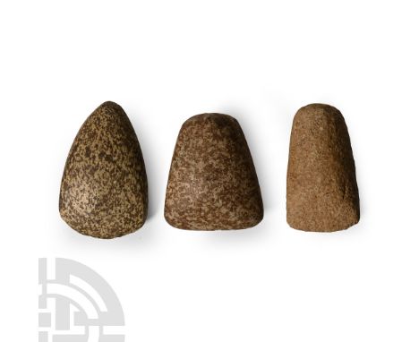 Neolithic Period, circa 6th-4th millennium B.C. Two with straight cutting edge, one with broad butt, one pointed and the thir