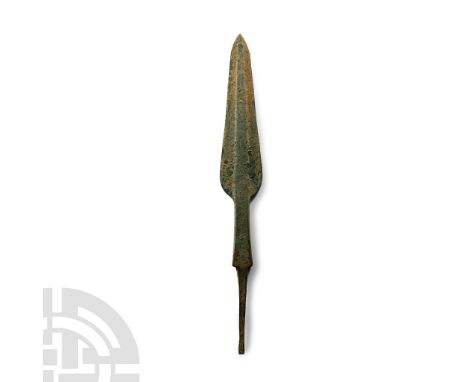 12th-11th century B.C. With heavily ridged and tapered leaf-shaped blade, long slightly flared neck and square section tapere