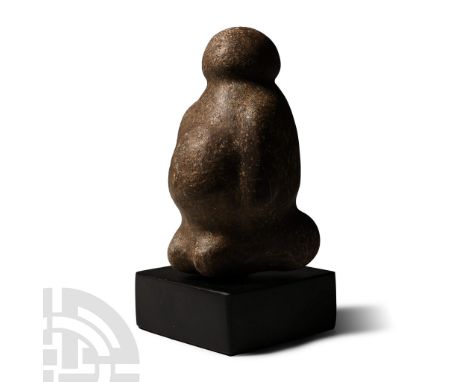 Neolithic Period, circa 6th-4th millennium B.C. or later. A carved and polished figurine with rounded head and broad shoulder