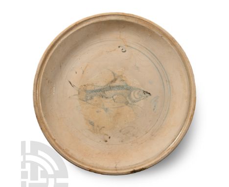 15th century A.D. With substantial basal ring, tondo with blue rings encircling a fish and fronds.  7.52 grams, 22.7 cm (9 in