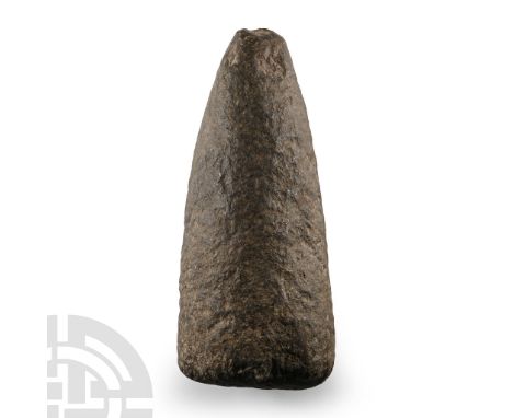 Neolithic-Early Bronze Age, circa 6000-4500 B.P. Tapering columnar form with rounded butt, chipped edges to striking face. Cf