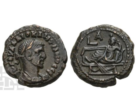 AD 284-305. Dated RY 1 (AD 284/285). Α Κ Γ ΟΥΑΛ ΔΙΟΚΛΗΤΙΑΝΟϹ ϹЄΒ, laureate and cuirassed bust to right / Tyche reclining to l