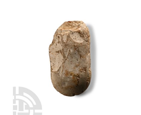 Neolithic Period, circa 4th-3rd millennium B.C. Chert with broad butt and curved edge; chipped.  168 grams, 90 mm (3 1/2 in.)