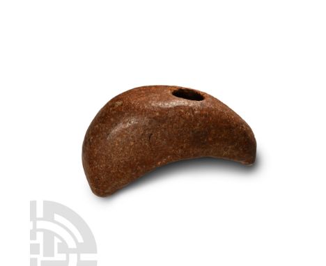 Neolithic Period, circa 4th-3rd millennium B.C. or later. With one large curved face and a shorter beak to the rear, D-shaped