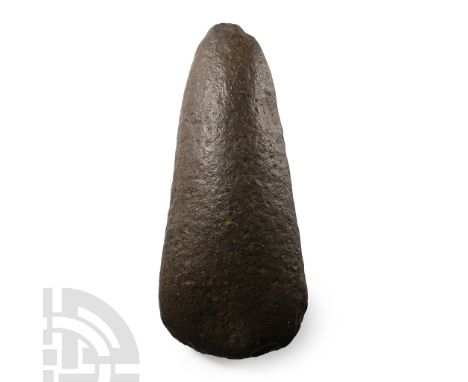 Neolithic-Early Bronze Age, circa 6000-4500 B.P. Lentoid in section, tapering from a rounded butt to a broad curved edge.  38