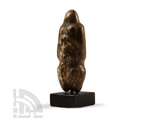 Neolithic Period, circa 6th-4th millennium B.C. or later. Modelled in the round as a figure with rudimentary head and limbs, 