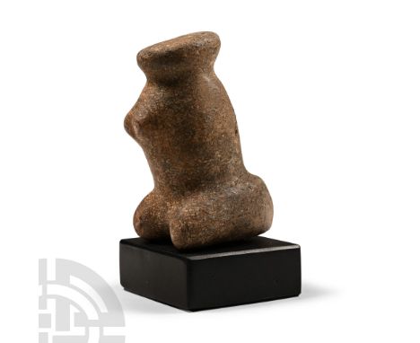 Neolithic Period, circa 6th-4th millennium B.C. or later. A carved and polished figurine with rounded head and broad shoulder