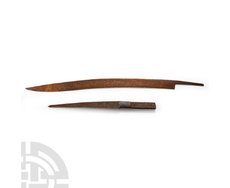 Circa 19th century A.D. Comprising: long, narrow single-edged blade with swept profile and long tip; short, sturdy single-edg