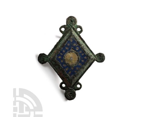 2nd-3rd century A.D. With a lozenge-shaped body decorated with a ring-and-dot lug to each corner, suspension loops to each si