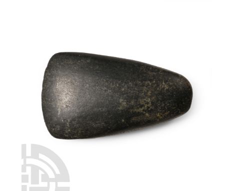 Neolithic Period, circa 4th-3rd millennium B.C. Small triangular axehead with bifacial blade, narrow square butt.  79 grams, 