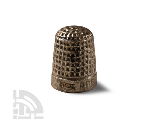 19th century A.D. Tailor's thimble with maker's mark'[.] &amp; FD Ltd' and hallmarks.  15.5 grams, 16 mm (5/8 in.). [No Reser