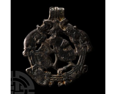 Circa 9th-11th century A.D. Openwork pendant with integral loop, Kipplingeberg type with regardant beast and foliage; widespr