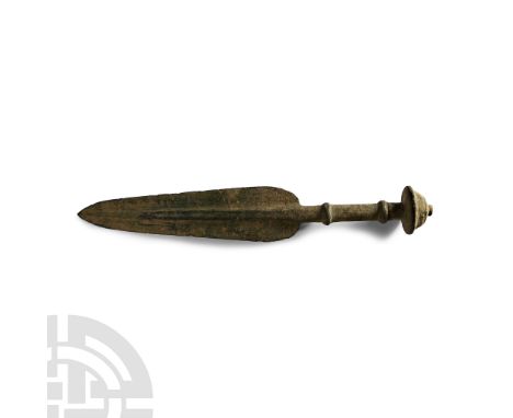 13th-7th century B.C. With ogival blade featuring a square sectioned mid-rib, tubular handle with two horizontal grooves of c