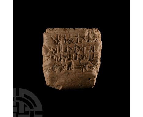 2nd millennium B.C. Pillow-shaped with impressed cuneiform text to one broad face and one long edge; repaired. Cf. cuneiform 