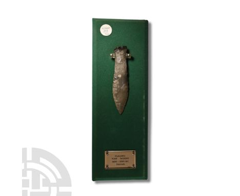 Neolithic Period, 3rd millennium B.C. In mottled grey flint, bifacially flaked with integral handle and lentoid-section blade