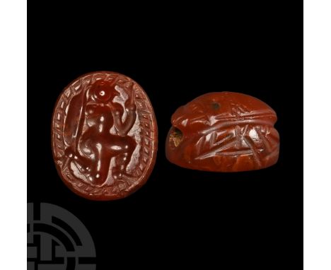 3rd century B.C. With mouth and carapace detailing to the upper face, underside with intaglio image of a crouching warrior wi