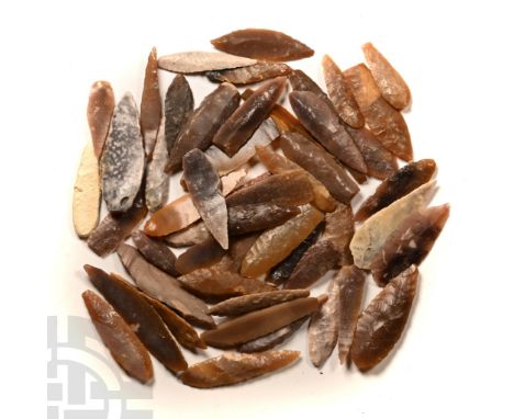 Neolithic Period, circa 6th-4th millennium B.C. Comprising mostly bifacial and uniface scaphoid flint and chert arrowheads; p