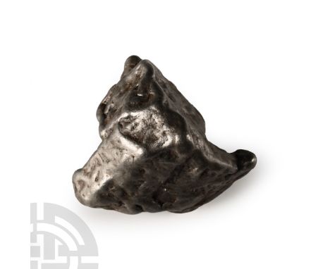 Fell 12th February 1947 A.D. A coarse octahedrite class IIB iron meteorite from a witnessed fall in the former USSR.  31 gram