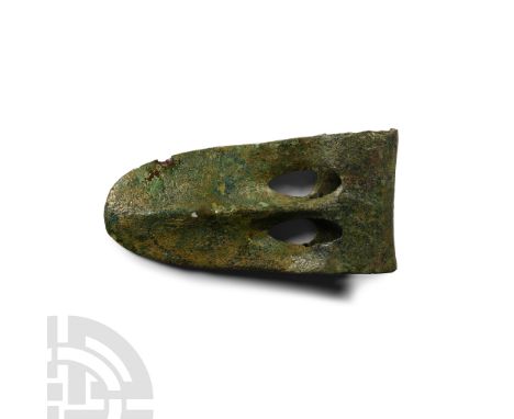 Early 2nd millennium B.C. With a curved, beak-shaped blade and two pierced eyes flanking a raised median ridge ellipsoid-sect