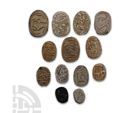 Second Intermediate Period-New Kingdom, circa 17th-12th century B.C. A group of thirteen scarabs with anatomical detailing to