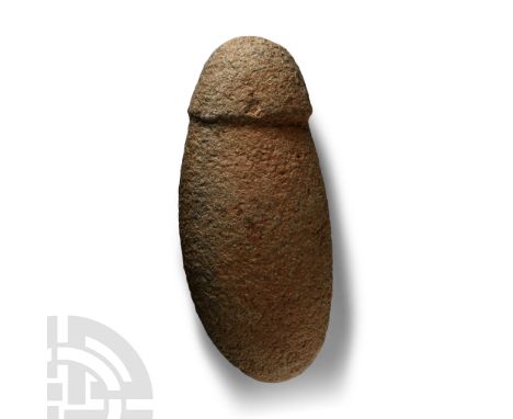 Neolithic Period, 5th-3rd millennium B.C. Lentoid in section with rounded cutting edge, carinated butt formed as a phallus.  