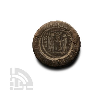1st-4th century A.D. Discoid in plan, both sides with Jupiter presenting Victory on globe to an emperor, legend surrounding. 