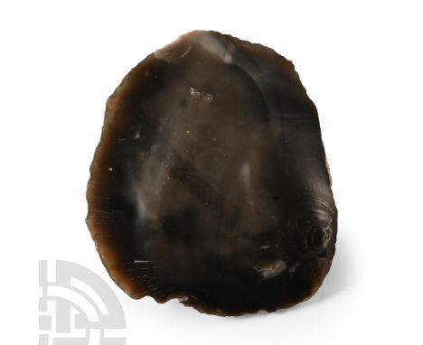 Neolithic Period, 8500-6500 B.C. Cordate in plan with cortex to upper face.  69 grams, 67 mm (2 5/8 in.). [No Reserve]Found i