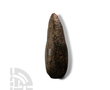 Neolithic Period, circa 4th-3rd millennium B.C. or later. With narrow edge, ellipsoid-section body, pointed butt.  310 grams,