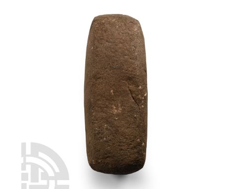 Neolithic Period, circa 6th-4th millennium B.C. With narrow blade and rounded butt.  689 grams, 15 cm (5 7/8 in.). [No Reserv