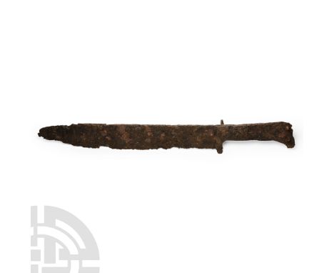 15th-16th century A.D. Comprising a single-edge blade with swept point, thick bolster with lateral spur, rivets for lateral o
