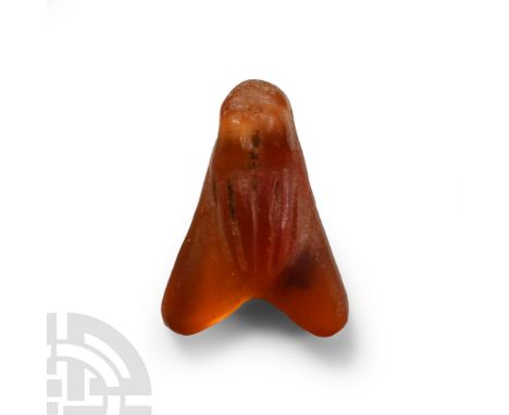 Late Period, 664-332 B.C. Formed as a fly with long triangular wings and domed eyes. Cf. Andrews, C., Amulets of Ancient Egyp
