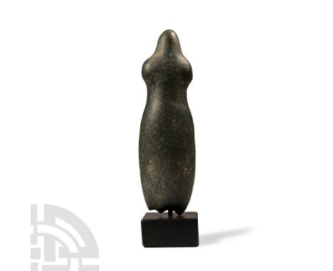 Neolithic Period, circa 6th-4th millennium B.C. or later. Tall with rounded profile, stub arms and head without facial detail