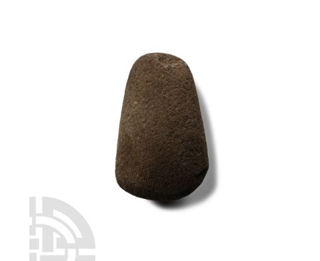 Neolithic Period, circa 4th-3rd millennium B.C. Squat and rounded with old collector's label 'North[..] / used as / a hammer 