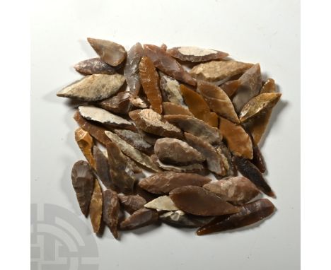 Neolithic Period, circa 6th-4th millennium B.C. Comprising mostly bifacial and uniface flint and chert arrowheads; probably f