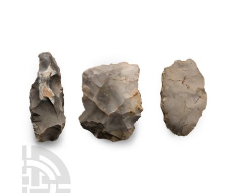 Neolithic Period, 4th-2nd millennium B.C. Plano-convex and lentoid-section with some cortex to surface; each with inked find 