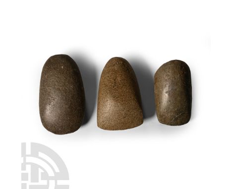 Neolithic Period, circa 6th-4th millennium B.C. Each lentoid in section with rounded butt and broad curved edge.  466 grams t