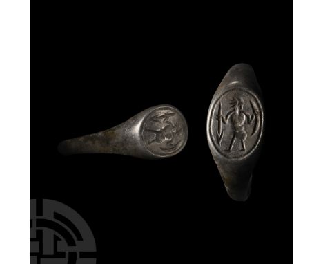 15th-16th century A.D. With discoid bezel, incised border, incuse standing warrior with helmet, spear and shield. Cf. Chadour