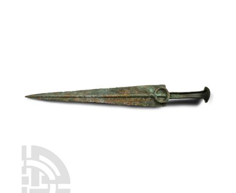14th-10th century B.C. A short sword or dagger with slender triangular blade, low round midrib with flat upper face, annular 