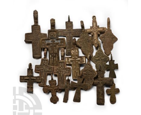 17th-19th century A.D. Cruciform and other pendants with low-relief text to one or both faces.  56 grams total, 25-51 mm (1 -