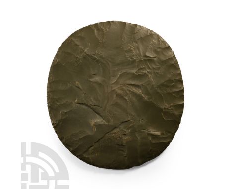 Neolithic Period, circa 6th-4th millennium B.C. Biconvex in profile and almost perfectly circular in plan. Cf. MacGregor, A. 