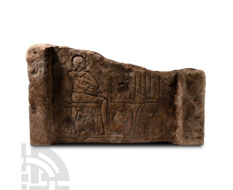 Middle Kingdom, circa 1900-1750 B.C. Rectangular panel from a false door stela carved in sunk relief with raised vertical bor