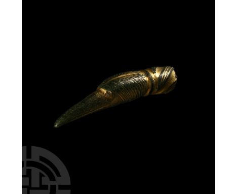 6th-8th century A.D. Slender in form and gently curved, formed as the head and neck of a crane with narrow beak and inset gla