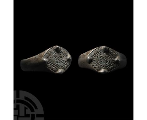 15th-16th century A.D. With scaphoid bezel, hatched border, tessellated quatrefoils and four granule turrets. Cf. Chadour, A.