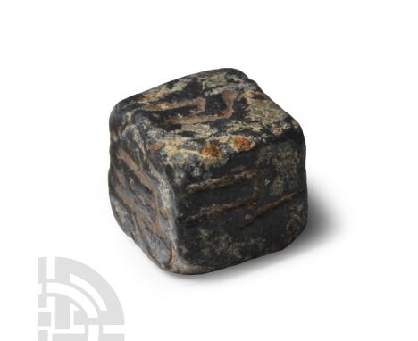 BRONZE TO IRON II AGE, CIRCA 12TH-6TH CENTURIES B.C. In the form of a cube engraved on six sides.&nbsp;Hendin, Ancient Scale 